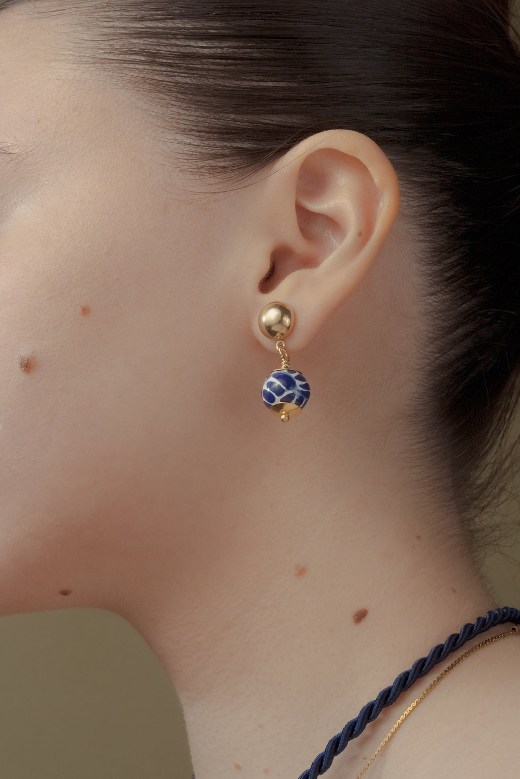 Arete broquel