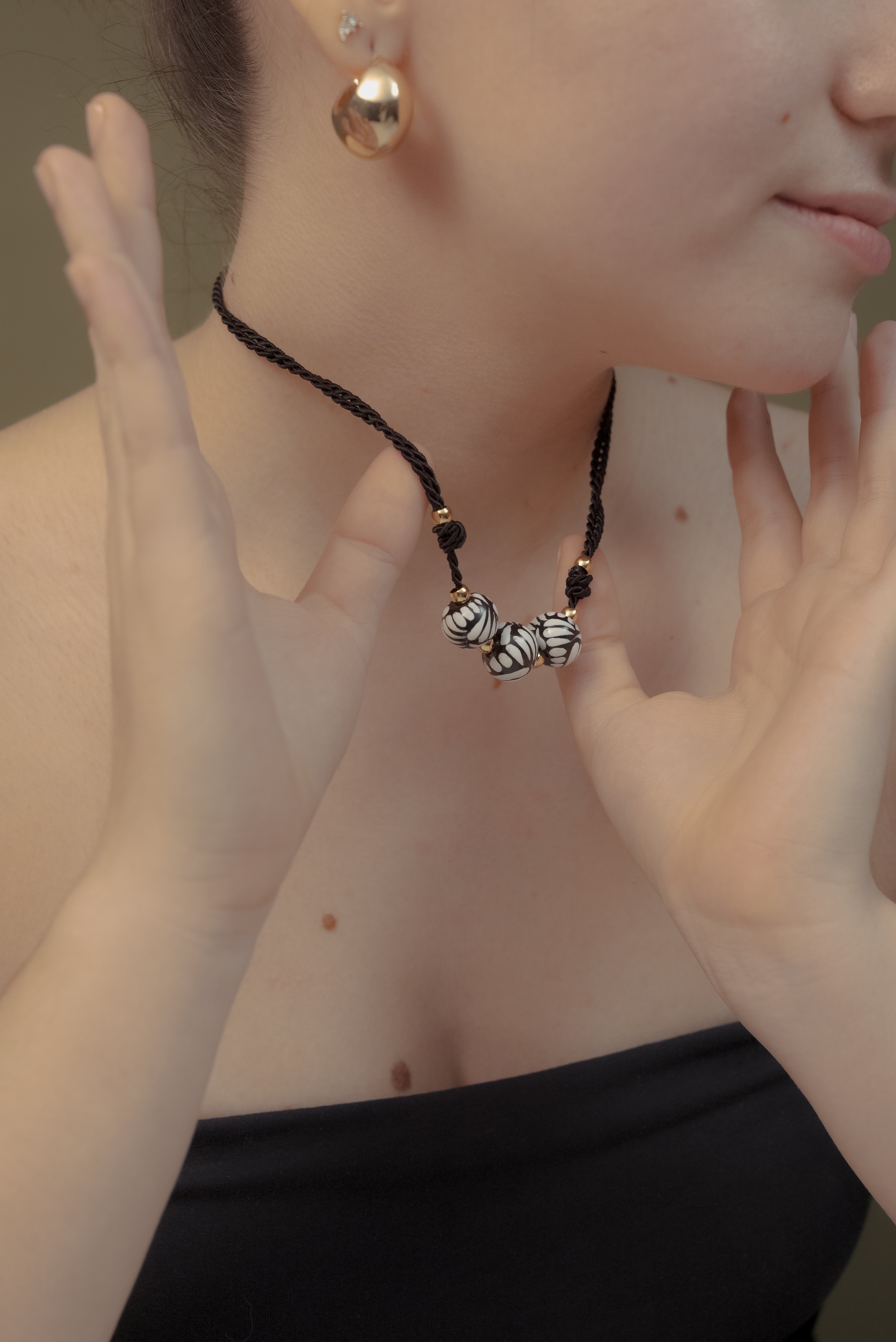 Collar tres esferas