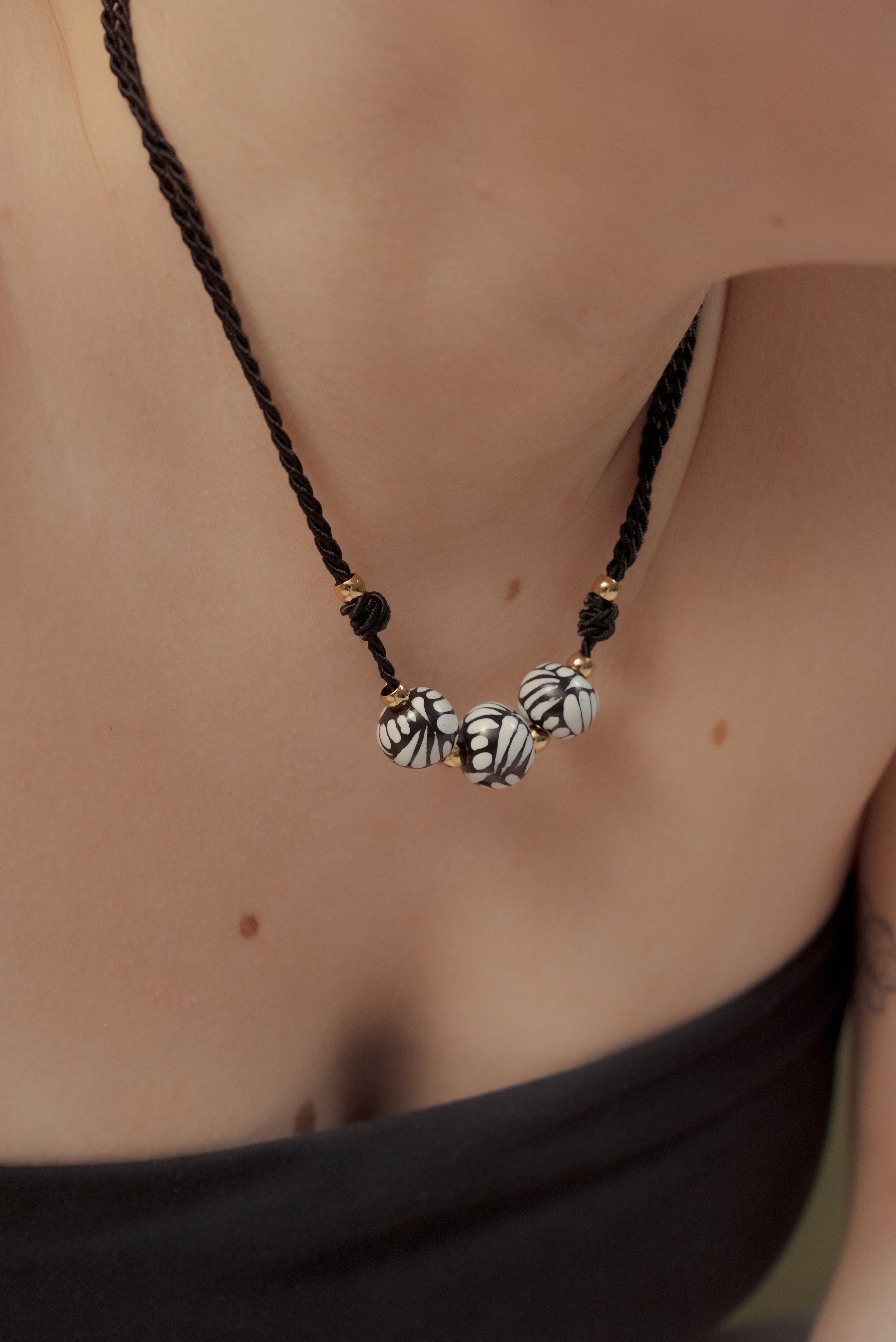 Collar tres esferas