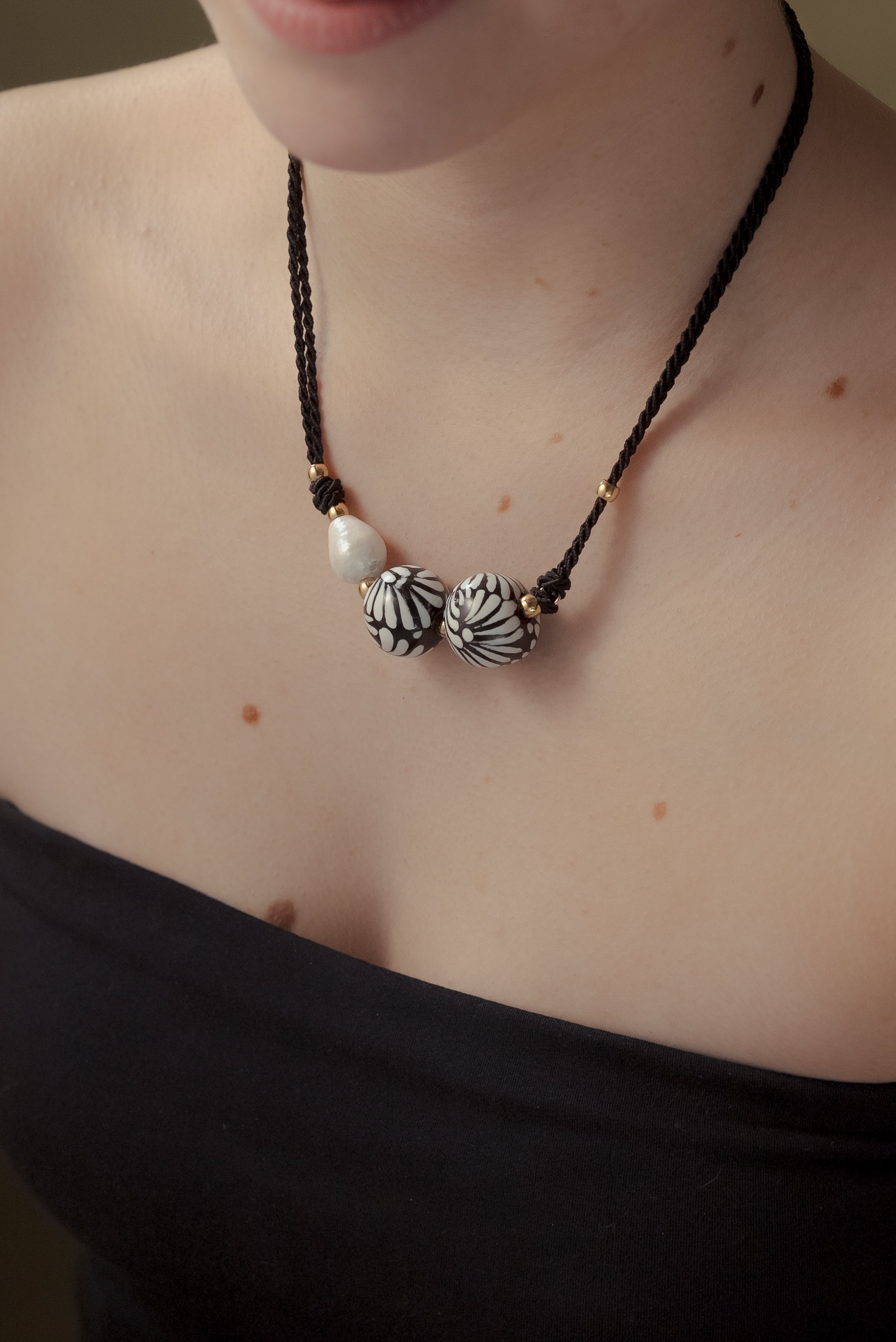 Collar dos esferas