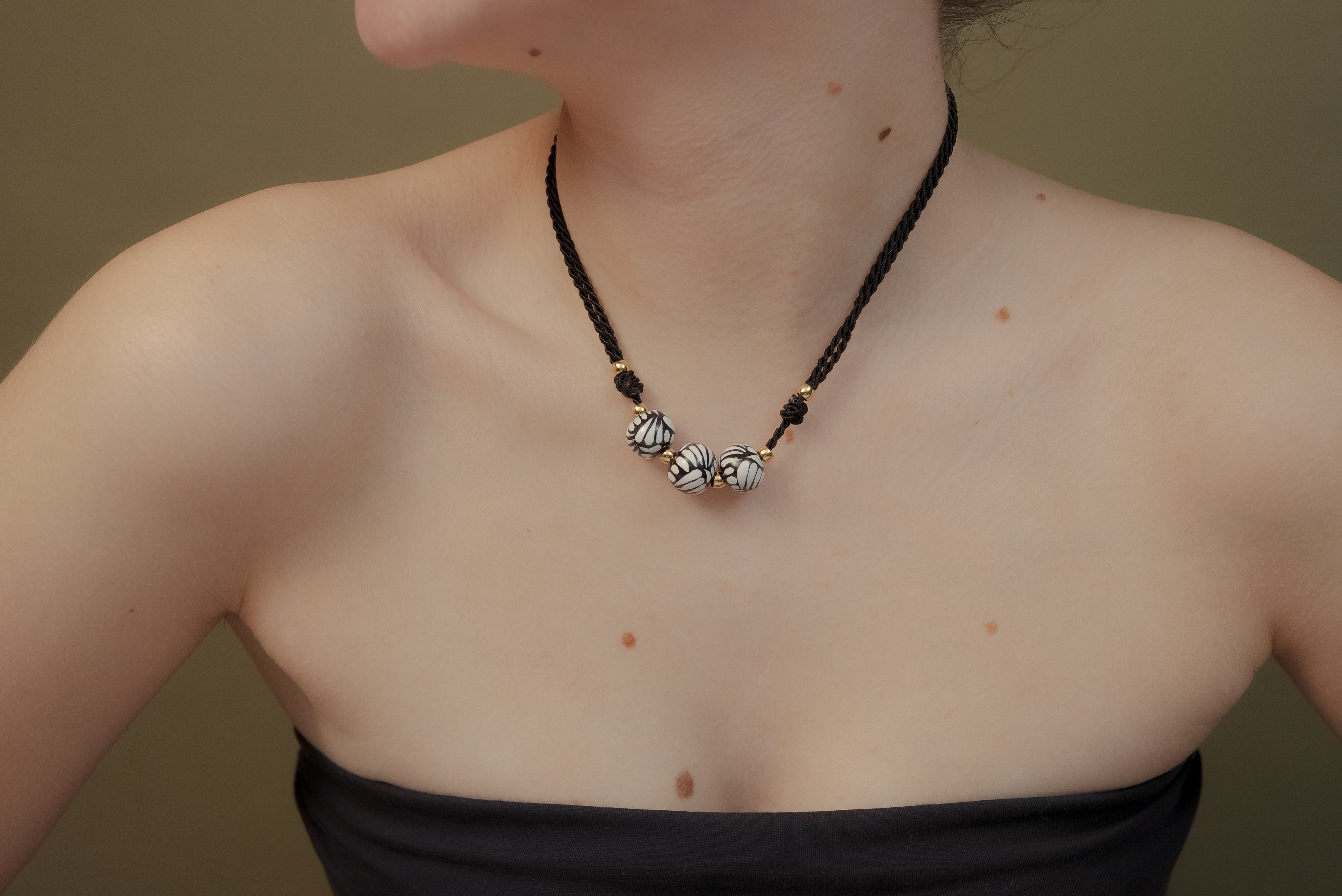 Collar tres esferas