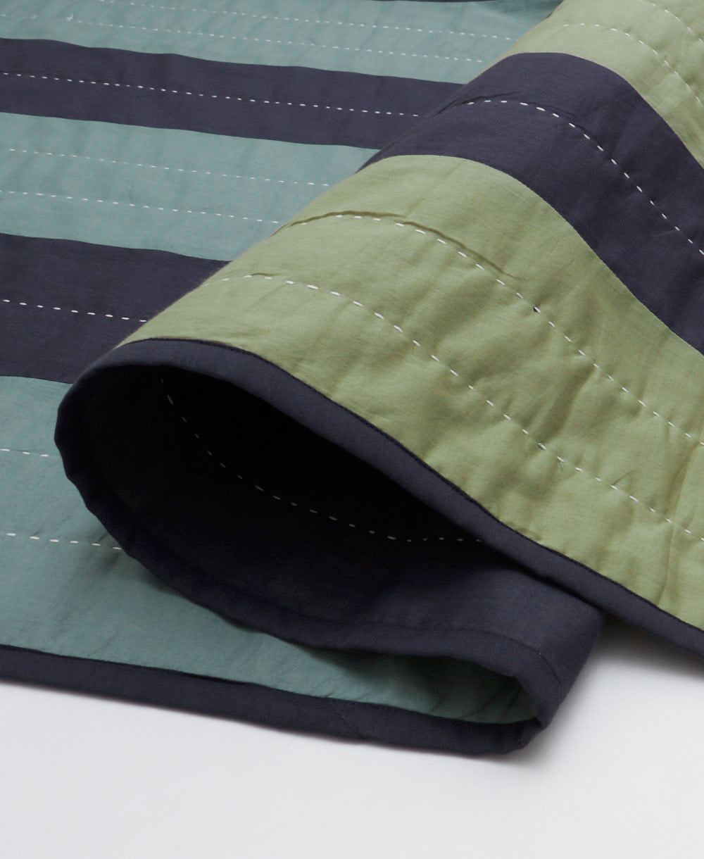 Colcha patchwork Offset enrollada